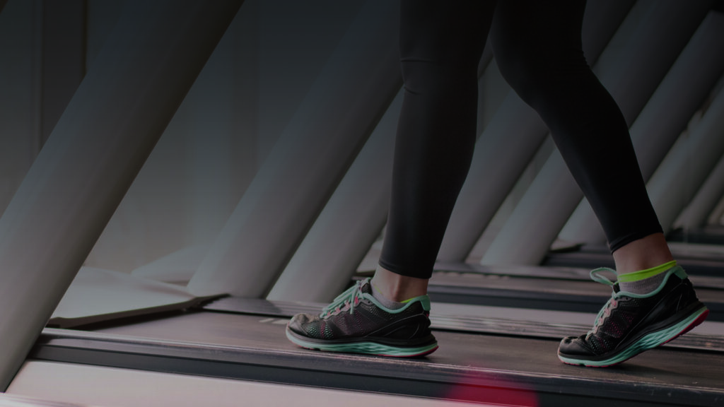 women walking on a treadmill
