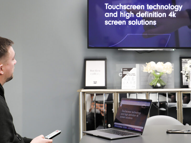 Print Room Manager, Sam, configures Innoscreen tech