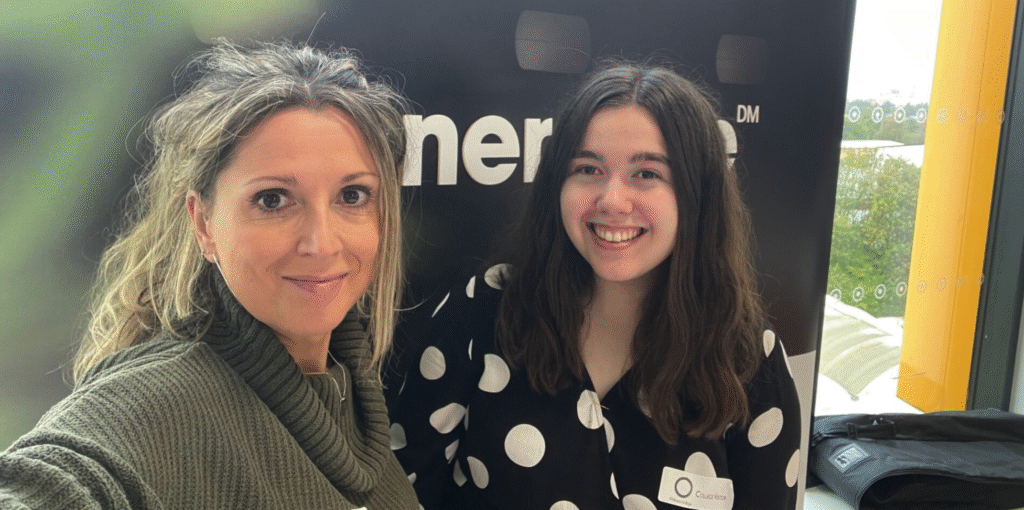 Gill and Maddy speaking at an event at Oldham College