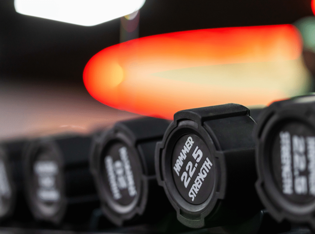 Close up shot of black dumbells in a leisure center gym